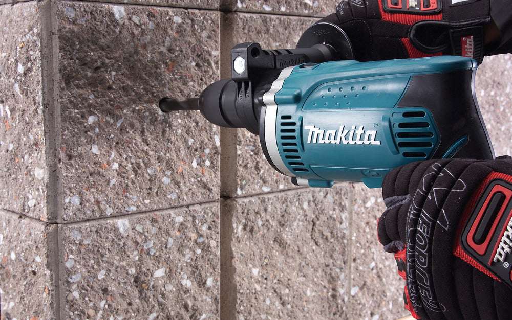 Makita Trapano elettrico Avvitatore con percussione 710W foratura - HP1631